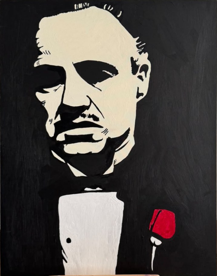 Portrait stylisé en noir et blanc de Marlon Brando dans le rôle de Vito Corleone, portant un smoking avec une rose rouge à la boutonnière.